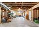 Unfinished basement with exposed wood beams and concrete floor at 140 Discovery Lake Dr, Fayetteville, GA 30215