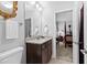 Bathroom featuring a granite countertop, classic sink, and gray walls at 140 Discovery Lake Dr, Fayetteville, GA 30215