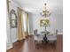 Breakfast nook has a modern chandelier and seating for two at 140 Discovery Lake Dr, Fayetteville, GA 30215