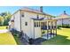 Beautiful home with a spacious deck, outdoor living area, and a well-maintained backyard at 140 Discovery Lake Dr, Fayetteville, GA 30215