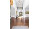Elegant foyer with hardwood floors, soaring ceilings, and a grand staircase leading to the upper level at 140 Discovery Lake Dr, Fayetteville, GA 30215