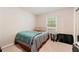 Bedroom showcasing carpeted floors and a window at 165 Wellington Dr, Mcdonough, GA 30252