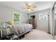 Bedroom showcasing hardwood floors and a ceiling fan at 165 Wellington Dr, Mcdonough, GA 30252