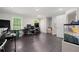 A spacious office area boasts natural light and functional workspace, perfect for productivity at 165 Wellington Dr, Mcdonough, GA 30252