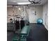 Fully equipped fitness room with weight machines, rubber flooring, and natural light at 3083 Colonial Way # E, Atlanta, GA 30341