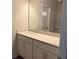 Bathroom featuring vanity with modern undermount sink, light-colored cabinets, and a mirror at 344 Riverwood Pass, Dallas, GA 30157