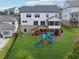 Home features a large backyard with a playset, deck, and screened-in porch, perfect for outdoor enjoyment at 4020 Connolly Ct, Roswell, GA 30075