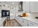 Bright kitchen featuring white cabinets, stainless steel appliances, and a center island at 4020 Connolly Ct, Roswell, GA 30075