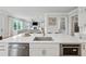 Spacious kitchen with a large island, white cabinets, and stainless steel appliances at 4020 Connolly Ct, Roswell, GA 30075