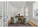 Cozy home office with natural light, hardwood floors, and comfortable seating at 4020 Connolly Ct, Roswell, GA 30075