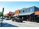 Street scene with retail and restaurant properties on a sunny day at 4020 Connolly Ct, Roswell, GA 30075
