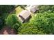Overhead image of home featuring mature trees surrounding its property with other residences nearby at 1177 Castle Way Way, Norcross, GA 30093