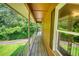 View of the balcony featuring wood floors, white railings and an exterior view of the community at 1177 Castle Way Way, Norcross, GA 30093