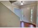 Bright foyer with hardwood floors, white trim, and a view of the front door at 1177 Castle Way Way, Norcross, GA 30093