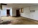 Basement view into other rooms needing repair, with holes in ceiling and floor at 2588 Sandtown Sw Rd, Marietta, GA 30060