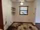 Small dining area with ceiling fan and natural light from window at 2588 Sandtown Sw Rd, Marietta, GA 30060
