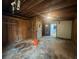 Unfinished garage space with exposed wood beams and unfinished walls, needing some TLC at 2588 Sandtown Sw Rd, Marietta, GA 30060