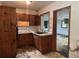 Traditional kitchen with wood cabinets and an open layout to other rooms at 2588 Sandtown Sw Rd, Marietta, GA 30060