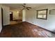 Spacious living room with hardwood floors, ceiling fan, and natural light at 2588 Sandtown Sw Rd, Marietta, GA 30060