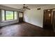 Bright living room with bay window and classic hardwood flooring at 2588 Sandtown Sw Rd, Marietta, GA 30060