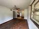 Open living area with connecting rooms, hardwood floors, and natural light at 2588 Sandtown Sw Rd, Marietta, GA 30060