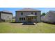 Backyard with a covered patio and a well-maintained lawn at 3005 Nicholas Dr, Villa Rica, GA 30180