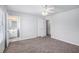 Bedroom with neutral carpet, closet door, and access to the bathroom at 3005 Nicholas Dr, Villa Rica, GA 30180