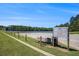 Community lake with a park, picnic area, and walking path at 3005 Nicholas Dr, Villa Rica, GA 30180