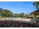 Enjoy the community pool and tennis courts with outdoor seating, all surrounded by beautiful landscaping and mature trees at 3005 Nicholas Dr, Villa Rica, GA 30180