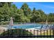 Inviting community pool with plenty of seating, perfect for a refreshing swim and relaxation in a lush, green setting at 3005 Nicholas Dr, Villa Rica, GA 30180