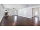 Open concept living room featuring hardwood floors, a fireplace, and neutral color palette at 3005 Nicholas Dr, Villa Rica, GA 30180