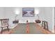 Cozy bedroom featuring unique decor and hardwood floors at 301 Cobblestone Trl, Avondale Estates, GA 30002