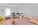 Comfortable bedroom with hardwood floors, two desks, and pillows with uplifting messages at 301 Cobblestone Trl, Avondale Estates, GA 30002