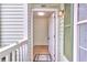 View of the condo's entryway with a light-colored floor and freshly painted walls at 301 Cobblestone Trl, Avondale Estates, GA 30002