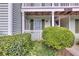 Charming condo with a covered porch and well-maintained landscaping at 301 Cobblestone Trl, Avondale Estates, GA 30002