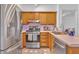 Modern kitchen with stainless steel appliances and ample cabinet space at 301 Cobblestone Trl, Avondale Estates, GA 30002