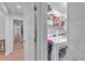 Laundry area with modern machines and storage space in the closet at 301 Cobblestone Trl, Avondale Estates, GA 30002