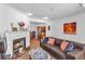 Living room with fireplace and views into the kitchen at 301 Cobblestone Trl, Avondale Estates, GA 30002
