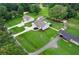 Aerial view of home and the surrounding properties with mature trees at 521 Peeples Valley Nw Rd, Cartersville, GA 30121
