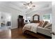 Spacious bedroom features tray ceiling, hardwood floors, and lots of natural light at 521 Peeples Valley Nw Rd, Cartersville, GA 30121