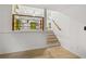 Open-concept floorplan features a living room area that connects to a kitchen area through a half-wall at 1239 Teakwood Trl, Stone Mountain, GA 30083