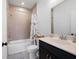 Cozy full bathroom featuring a combined shower and tub at 203 Holden Way, Woodstock, GA 30189