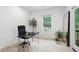 Bright office space with a large window and modern desk at 203 Holden Way, Woodstock, GA 30189