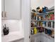 Walk-in pantry with abundant shelving next to modern kitchen at 203 Holden Way, Woodstock, GA 30189