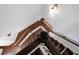 Close up view of hardwood staircase and railing at 203 Holden Way, Woodstock, GA 30189