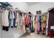 Walk-in closet featuring ample storage space, hanging rods, and shelving at 203 Holden Way, Woodstock, GA 30189
