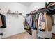 Walk-in closet featuring ample storage space and shelving at 203 Holden Way, Woodstock, GA 30189