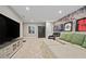 Spacious finished basement with large screen TV, comfortable seating, and stylish accents at 2118 Harmony Dr, Canton, GA 30115