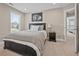 Cozy bedroom with a large window and soft, neutral colors at 2118 Harmony Dr, Canton, GA 30115