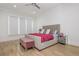 Bedroom features hardwood floors, a large window, and stylish furniture at 2461 Oak Grove Ne Ests, Atlanta, GA 30345
